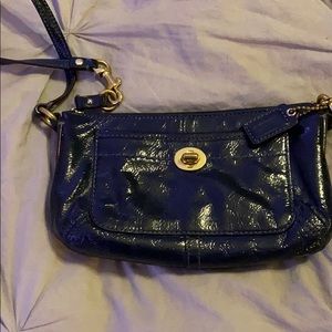 Blue and gold Coach Wristlet.  Great condition.